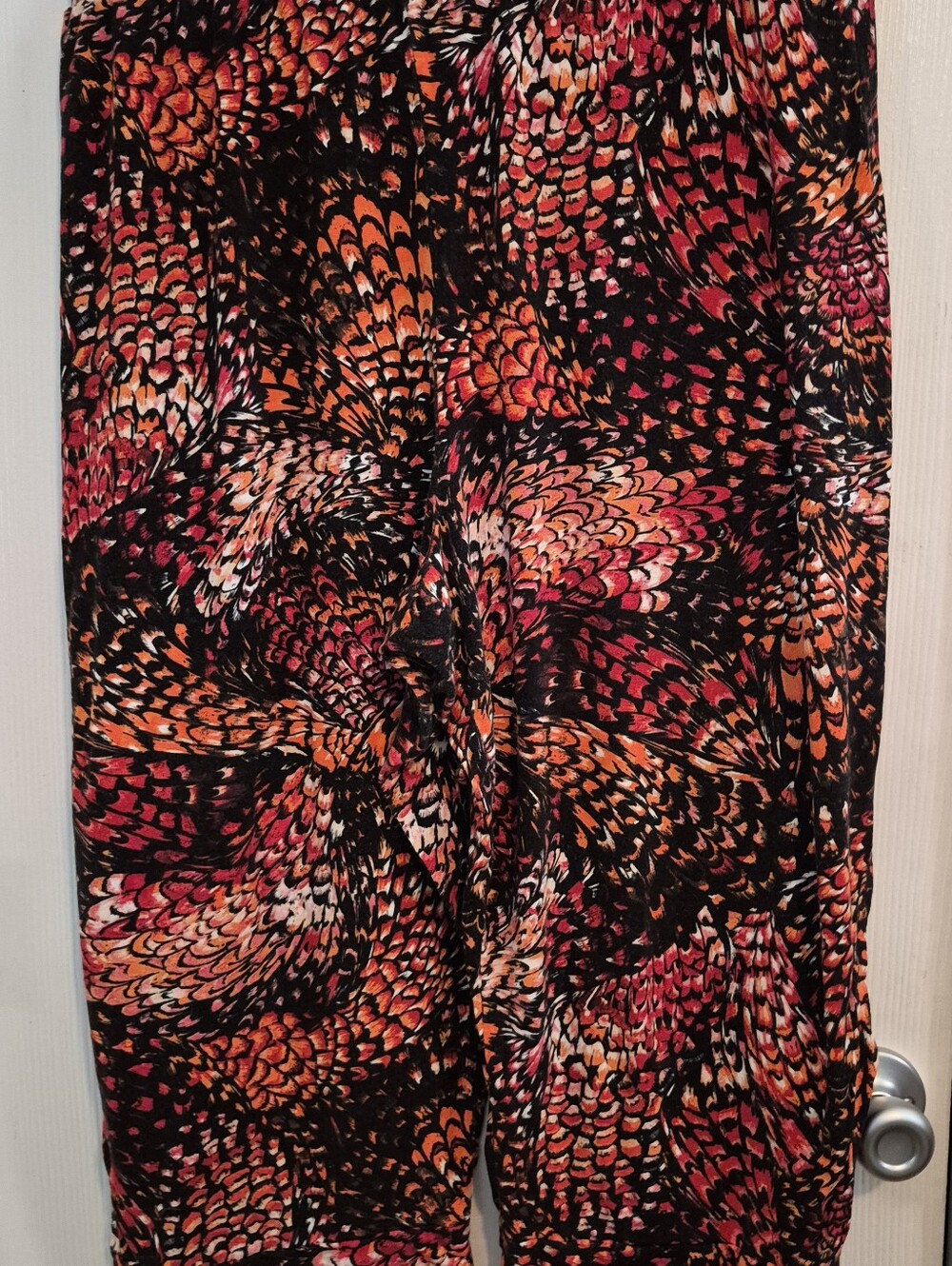 Women's Printed Capri Pants in Black with Red & Orange Feather Pattern